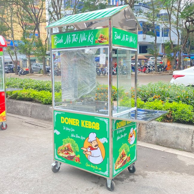 Bàn chế biến và lò nướng tích hợp trên xe bánh mì lưu động
