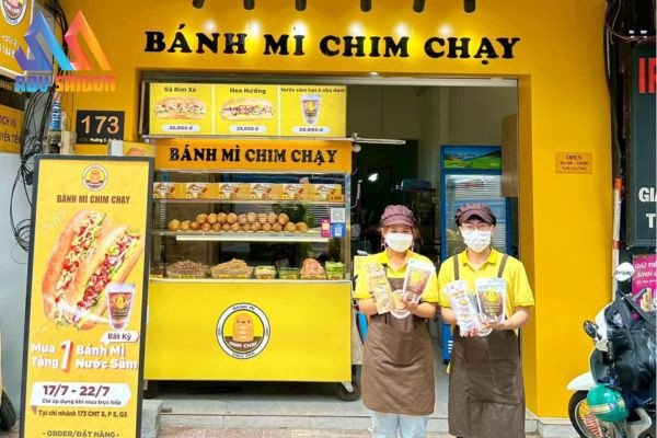 Bảng hiệu xe bánh mì alu chim chạy