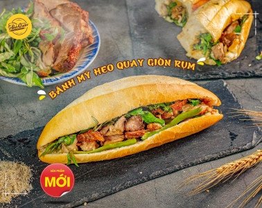 Bánh mì heo nướng lu tại Đà Nẵng với lớp thịt giòn rụm và rau củ tươi ngon