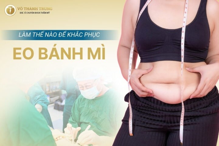 Người phụ nữ nhìn vào bụng mình với vẻ lo lắng