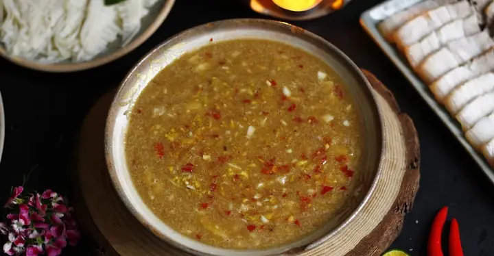 Lẩu gân bò măng cay