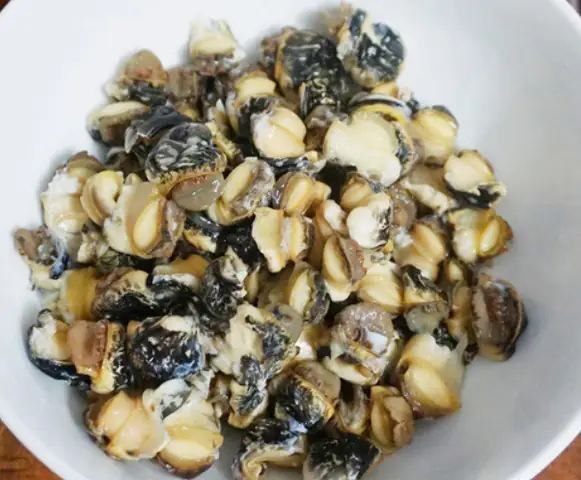 Cách Nấu Ốc Xào Măng Me Đậm Đà Chuẩn Vị Tại Nhà