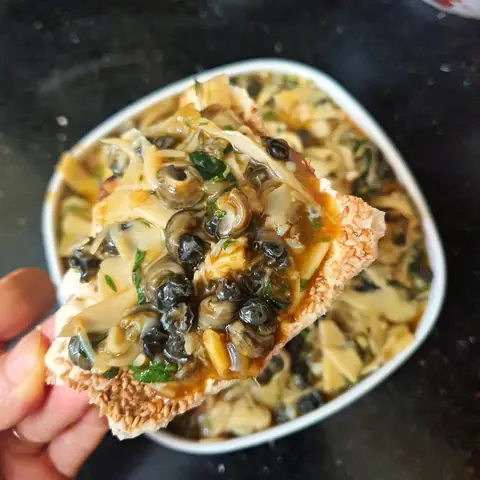 cách làm ốc xào măng cay