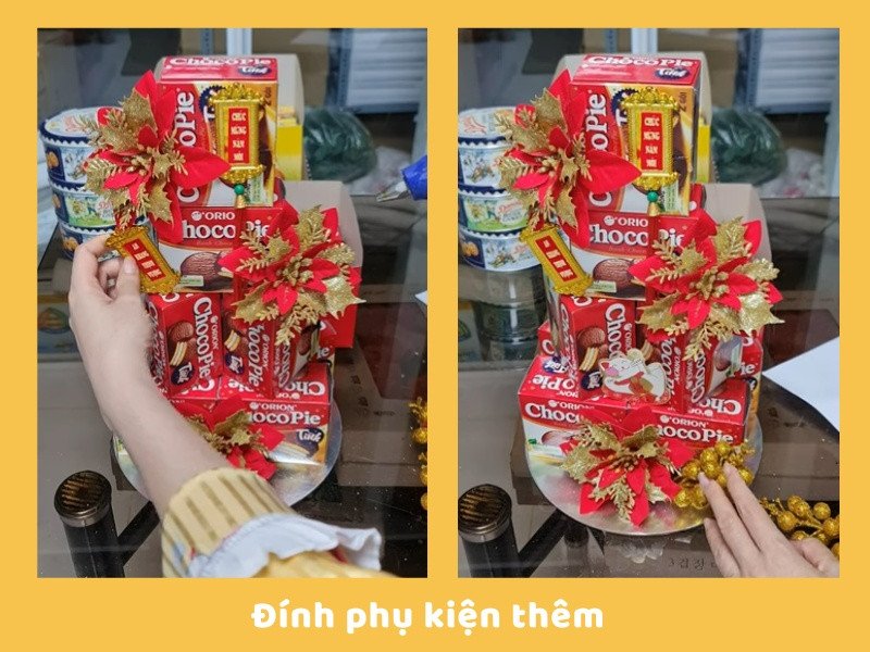 Gắn phụ kiện trang trí Tết lên tháp bánh Chocopie