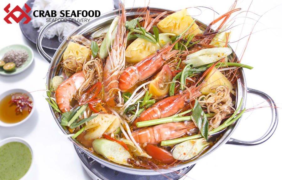 Nồi lẩu tôm chua cay hấp dẫn với màu sắc rực rỡ