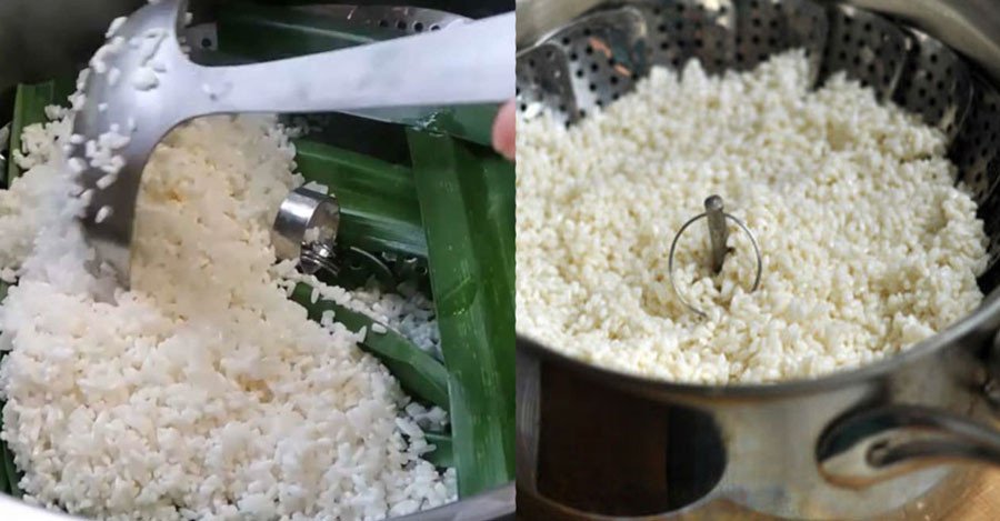 Trải đều gạo nếp bằng tay khi nấu xôi vò