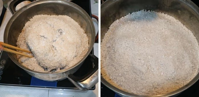 Ủ thịt heo muối khô trong nồi với lớp muối hạt rang đều, đảm bảo hương vị.
