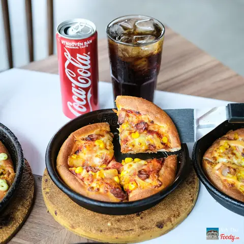 Đánh Giá Chi Tiết Pizza Hut Phan Xích Long: Trải Nghiệm Thực Tế & Phân Tích Toàn Diện