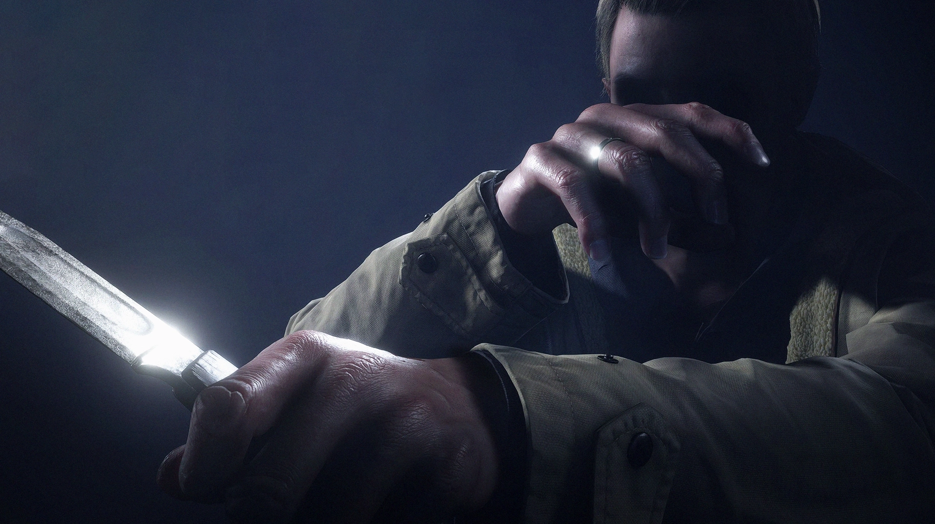 Ethan Winters wielding a knife with his face obscured